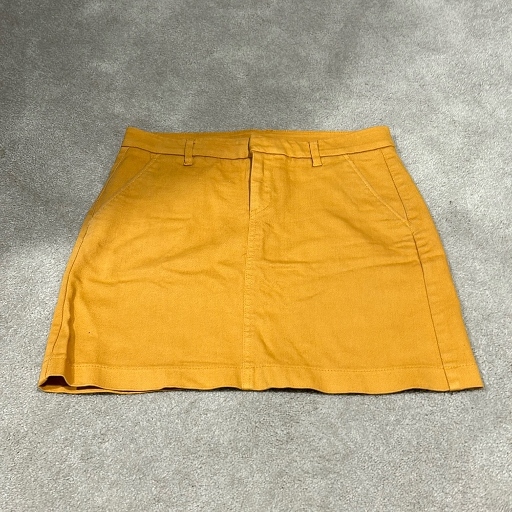 Women’s orange Uniqlo mini skirt size 12